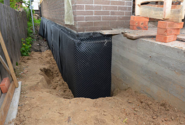 Happy homeowners after waterproofing job in Zanesfield